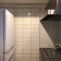 清潔感のあるデザイン性の高いタイルをキッチンに設置。 サムネイル